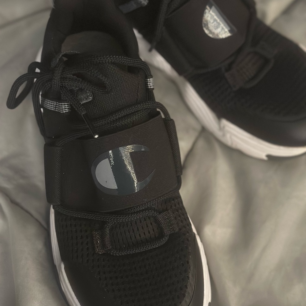 New champions black and white sneakers